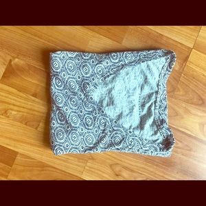 Navy blue & white patterned v neck.